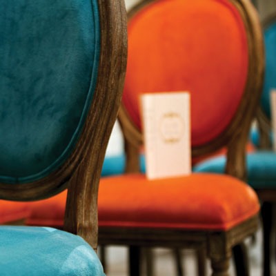 Orange and blue velvet chairs for wedding from Haven & Gather
