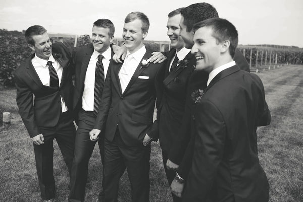 Classic black suits for groom and groomsmen by Knight's Menswear