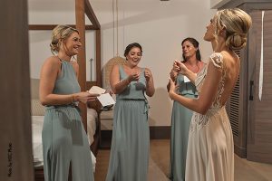 Bride giving the bridesmaids personal notes before the ceremony
