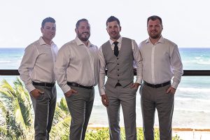 Groom and groomsmen in gray suits