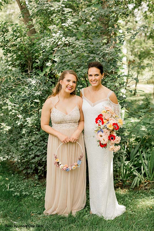 Bridesmaid wearing a sparkly blush gown