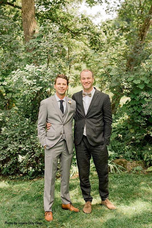 Groom and usher posing before the ceremony