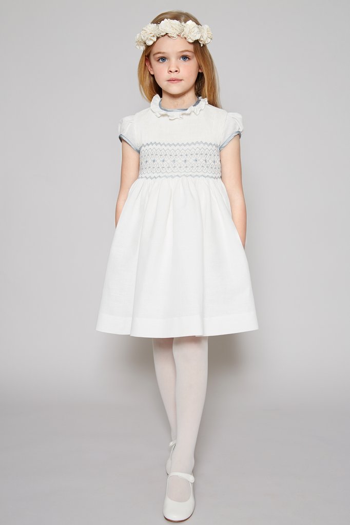 Flower girl in white dress