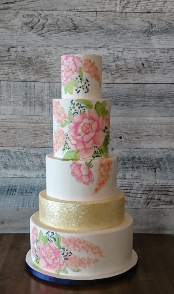 Pink and gold floral wedding cake 