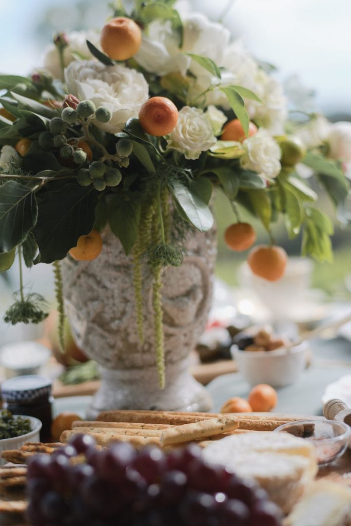 Wedding centerpiece with citrus and white flowers