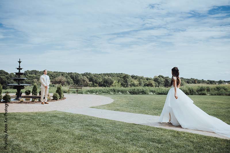 Bride and groom first look at elegant Minnesota wedding venue