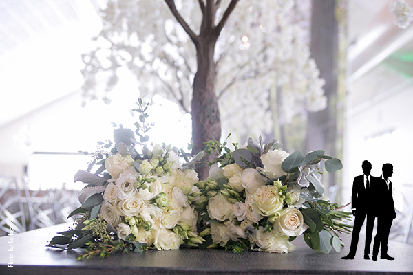 White rose and greenery wedding bouquets
