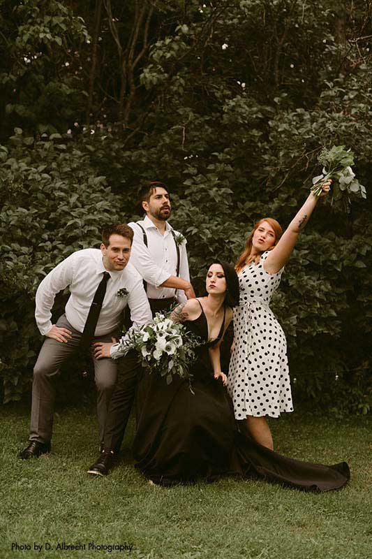 Wedding party poses for fun photo