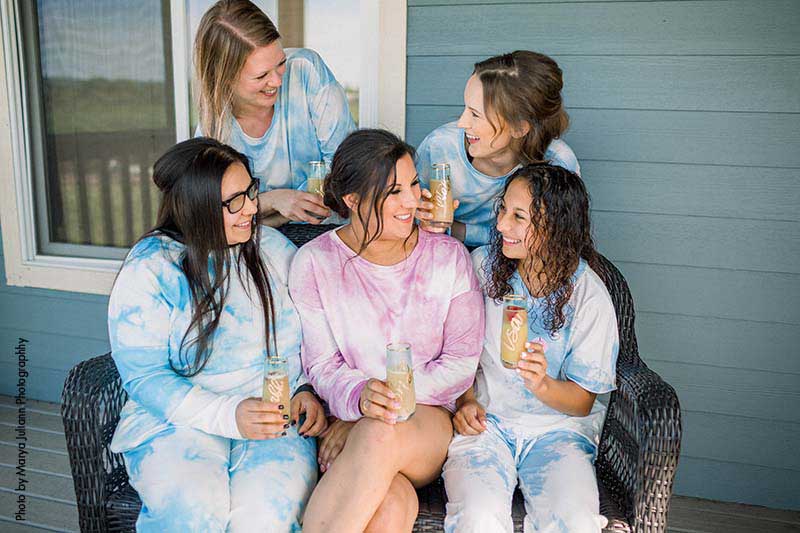 Brides and bridesmaids in tie-dye pajamas