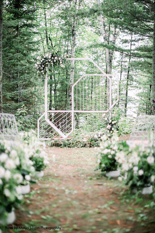 White geometric wedding arch