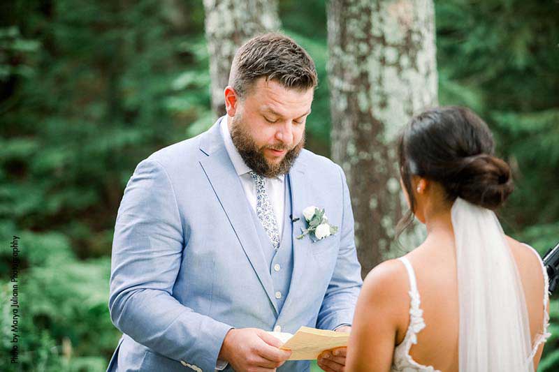 Groom reads vows at intimate wedding