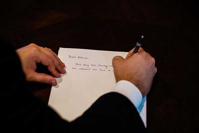 Groom writes vows before wedding