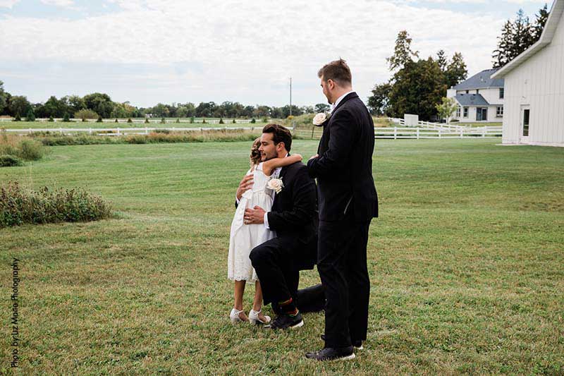 Grooms share first look with their daughter