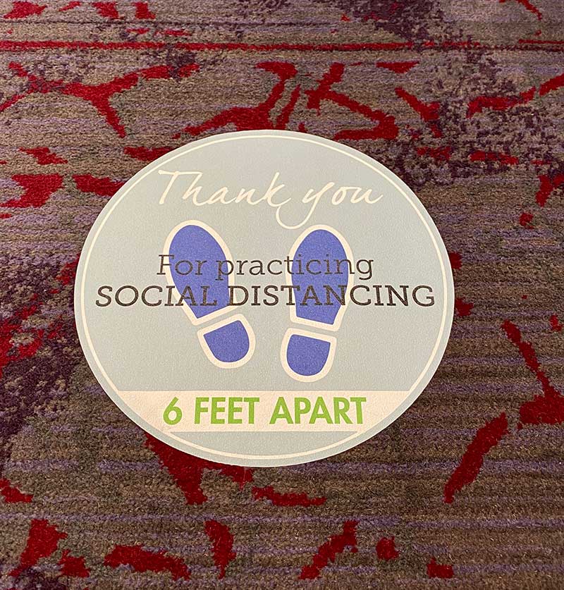 Social distancing floor sign