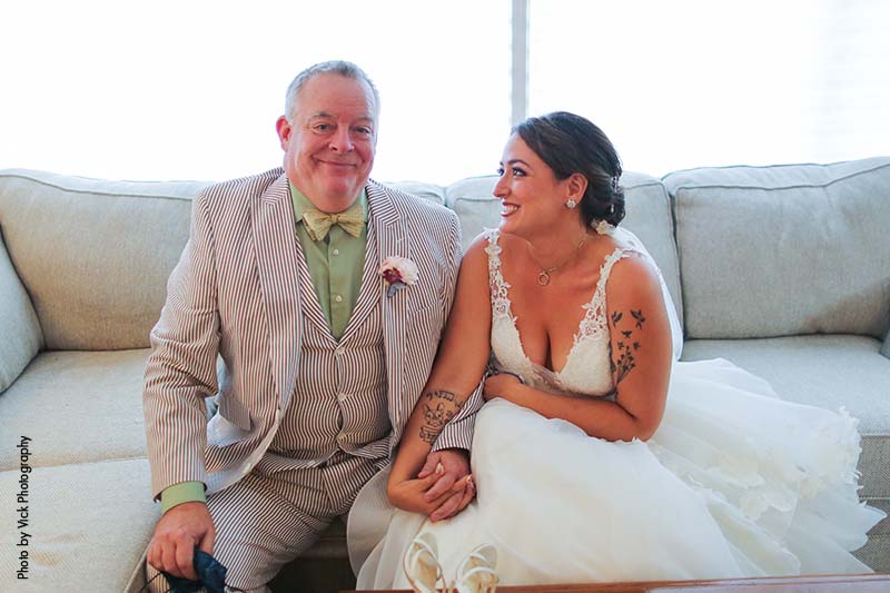 Brown and white striped father of the bride suit
