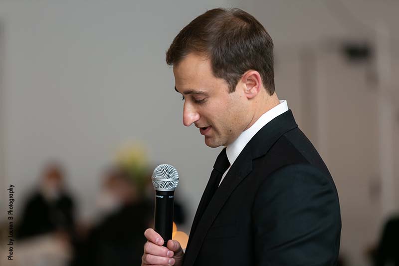 Best man gives speech at wedding