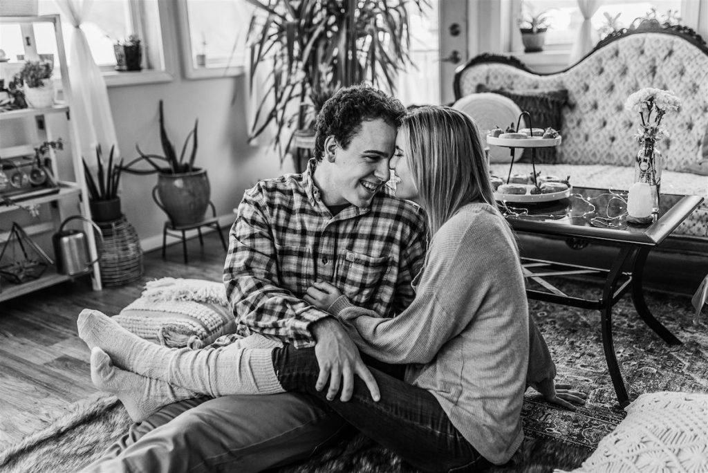 Couple at at-home engagement photoshoot