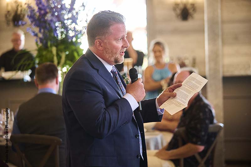 Best man gives speech at wedding