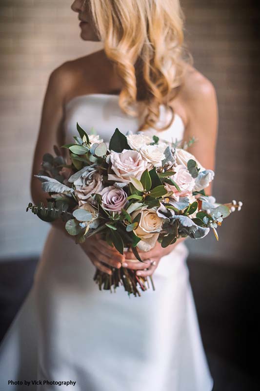 Assorted rose and greenery bridal bouquet