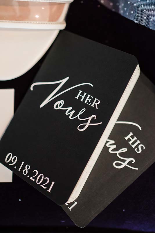 Custom black his and her vow books