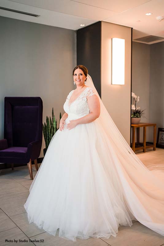 Bride wearing tulle wedding ballgown