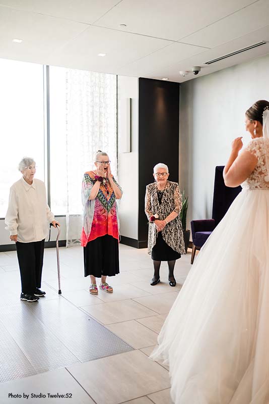 Grandmothers get the first look at the brides wedding dress