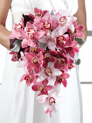 variety of pink & burgundy cymbidium orchid bouquet