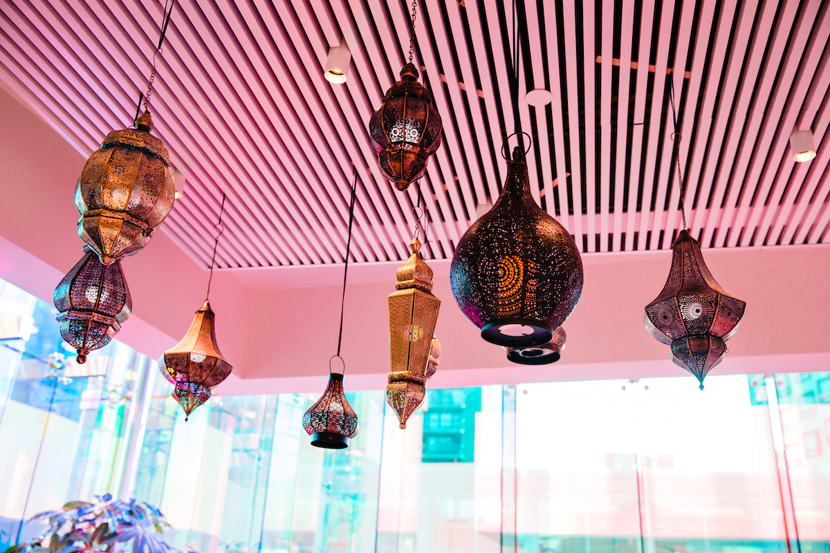 Indian lanterns hang from ceiling