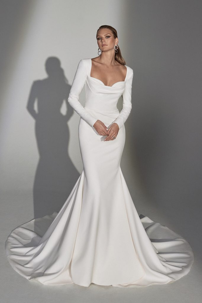 Long-sleeve bridal gown with cowl neck from Spring 2022 Bridal Fashion Week