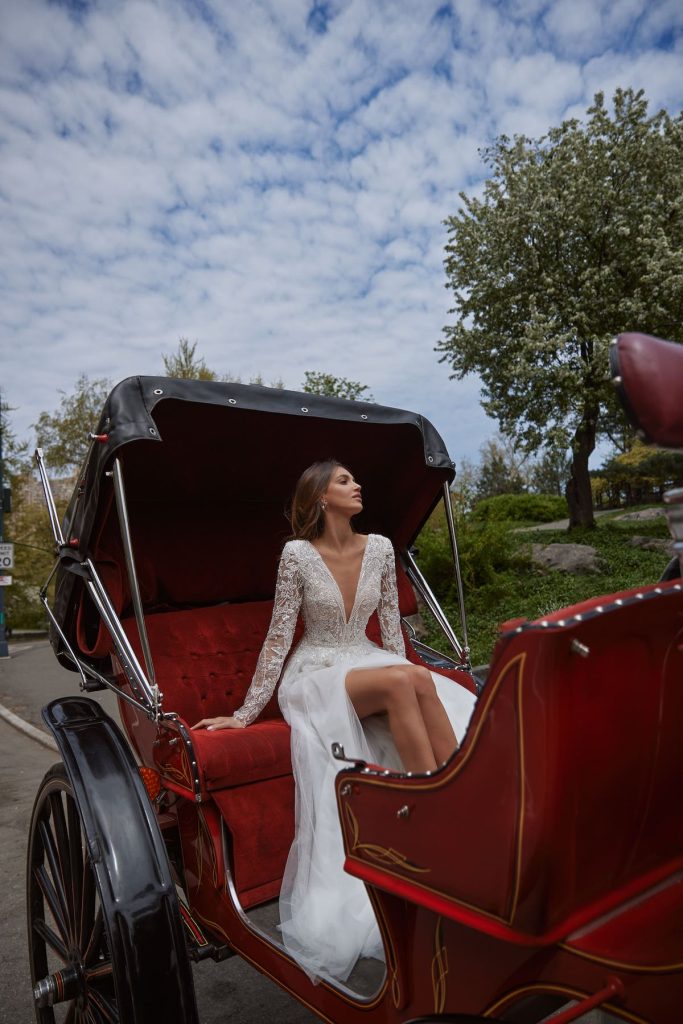 A-line bridal gown with long sleeves and high slit 