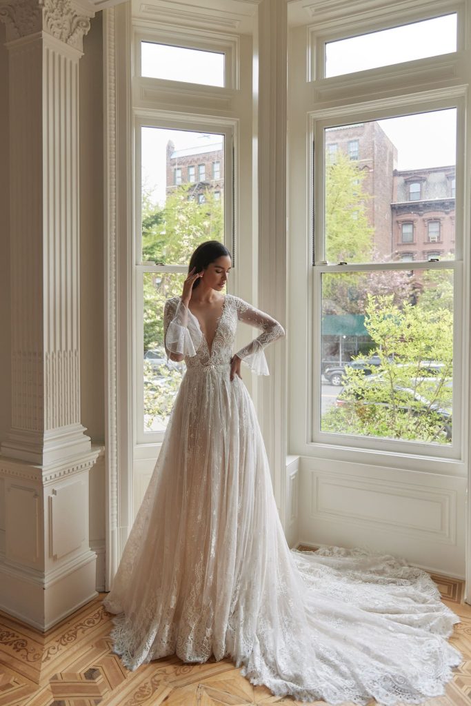 A-line v-neck wedding gown with floral patterns