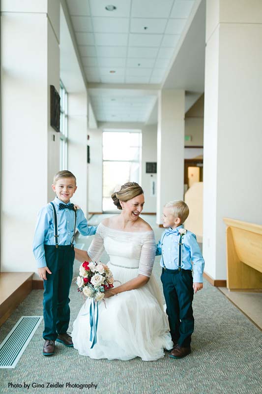 Bride with ring bearers before wedding ceremony