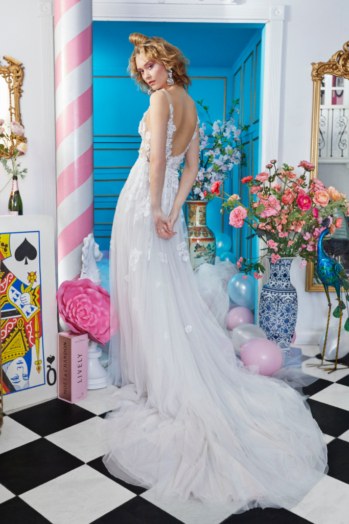 V-neck sheer embroidered ethereal A-line gown with 3 dimensional flowers