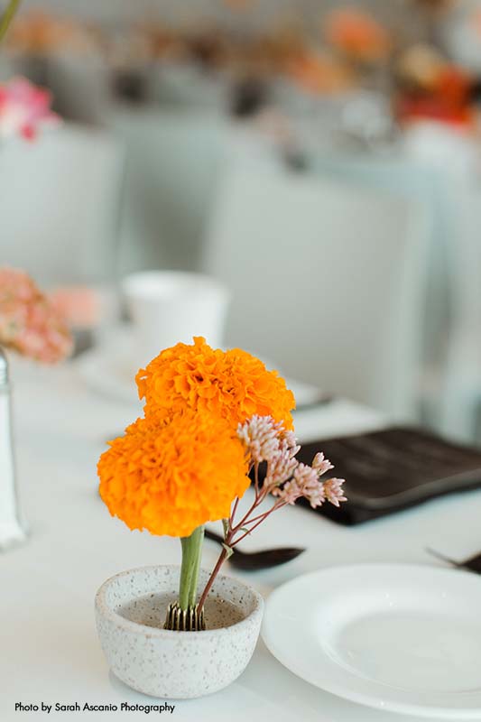 Simple orange flower wedding centerpiece