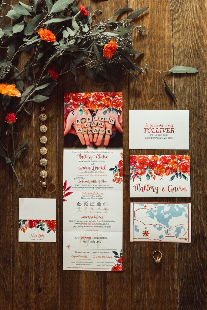 Fold out wedding invite with bright red floral