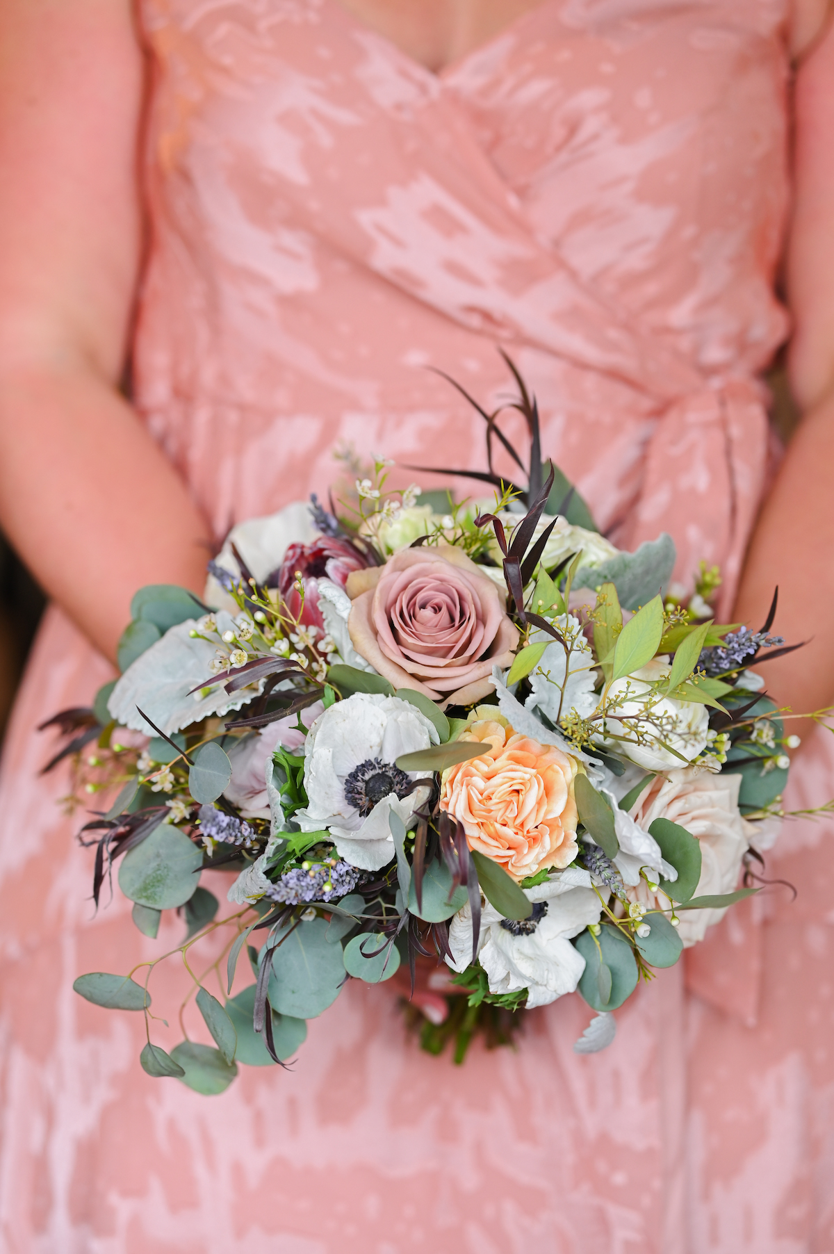 Bridesmaid bouquet with blush roses, anemone, and eucalyptus