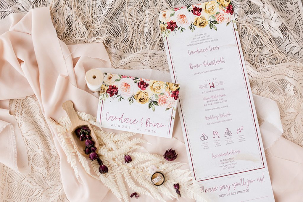 Wedding invitation and place card with boho flowers made by The UPS Store in Minnetonka