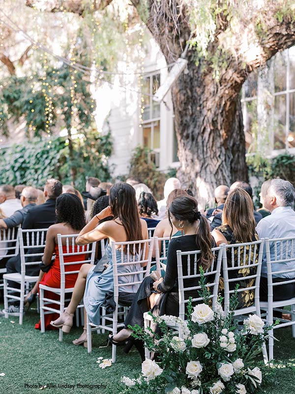 Guests at outdoor wedding ceremony