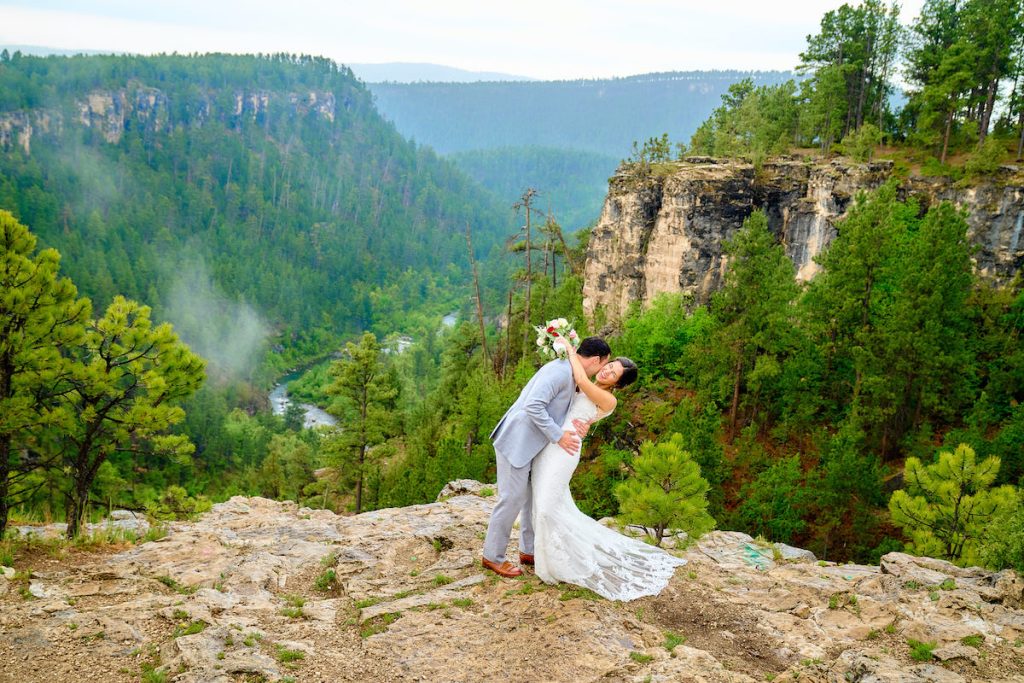 Bride and groom eloping on a mountaintop by Matthew Eberle Photography