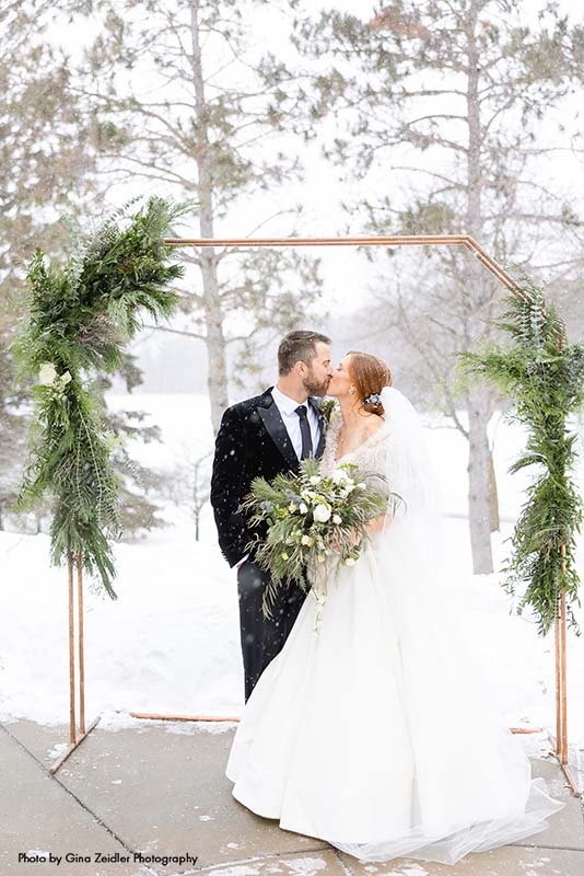 Outdoor winter wedding ceremony in Minnesota