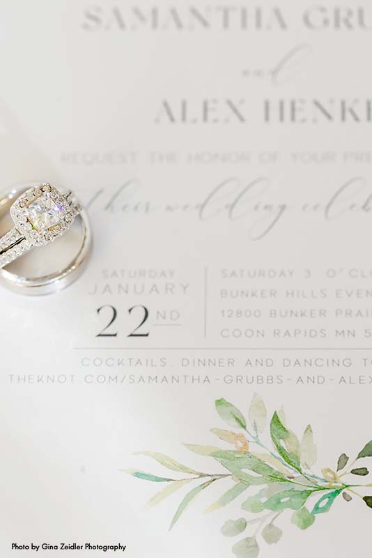 Classic white wedding invitation with greenery motif