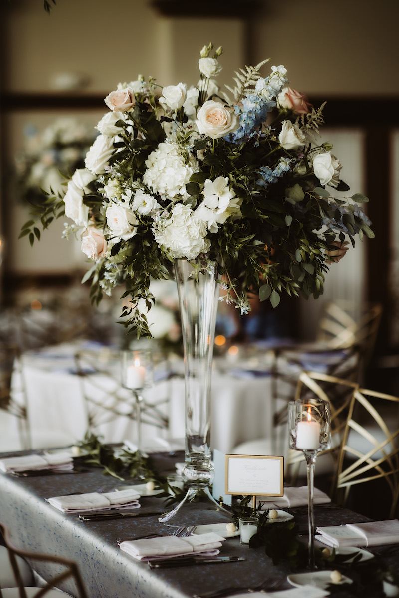 Tall pastel wedding floral centerpiece