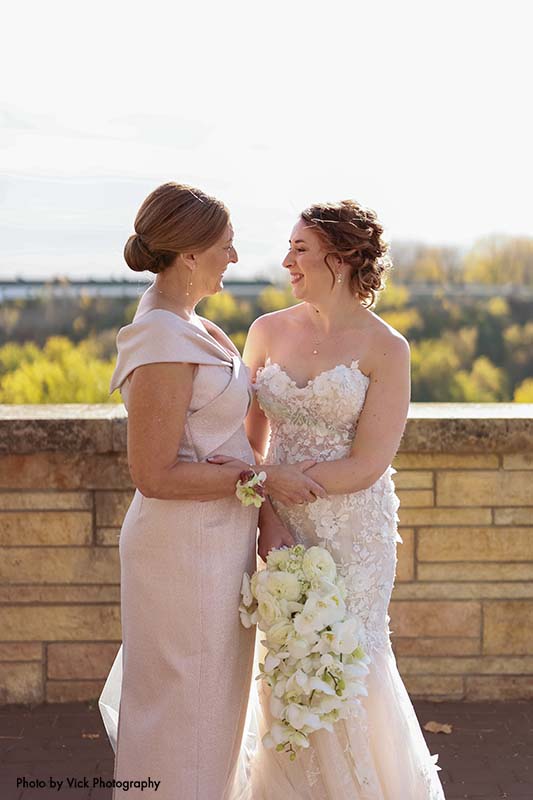 Bride poses with her mother