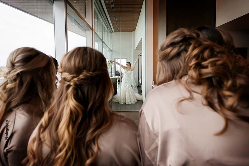 Bride shares first look with bridesmaids