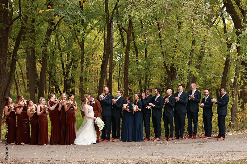 Wedding party in navy and burgundy attire