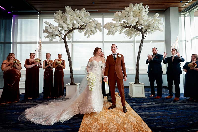 Bride and groom indoor fall wedding ceremony