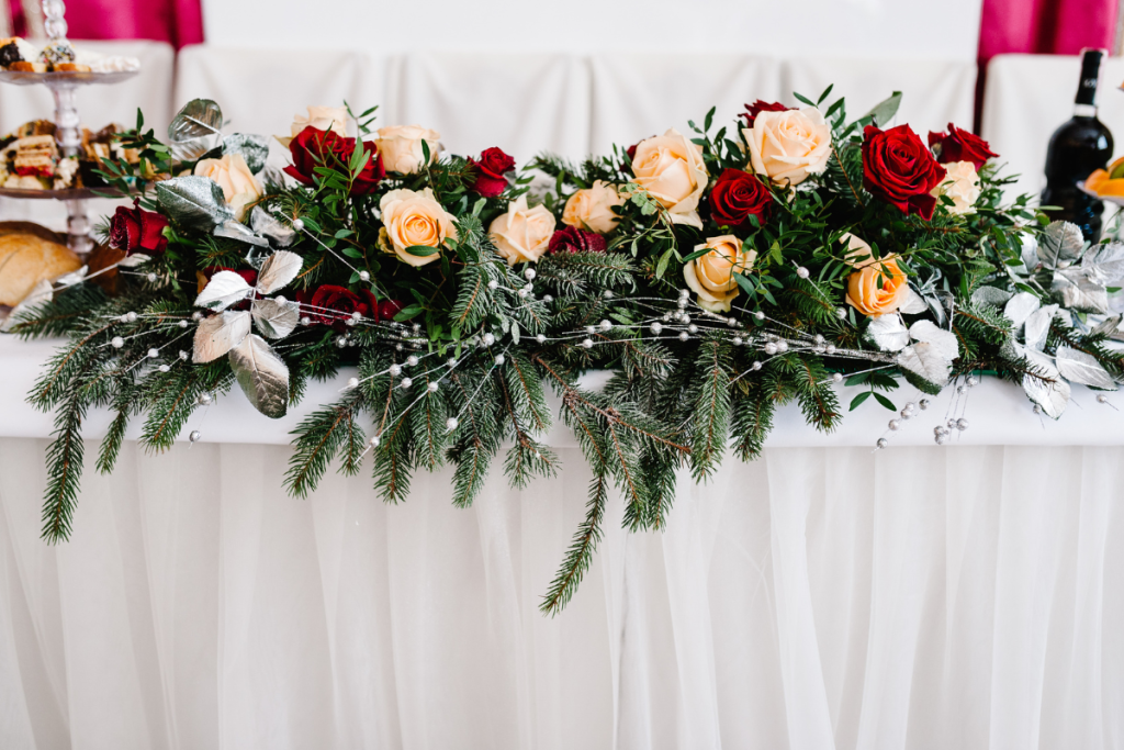 Winter wedding floral swag for sweetheart table