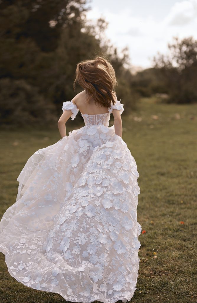 Floral appliqué bridal gown by Arava Polak