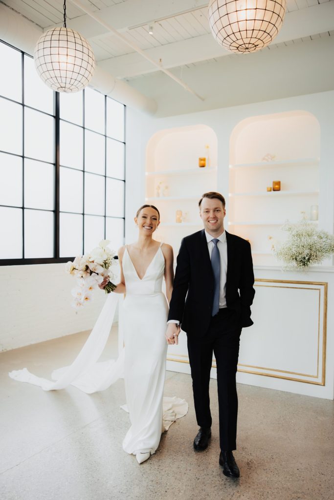 Bride and groom marry in an industrial modern wedding venue in Minneapolis, The Whim